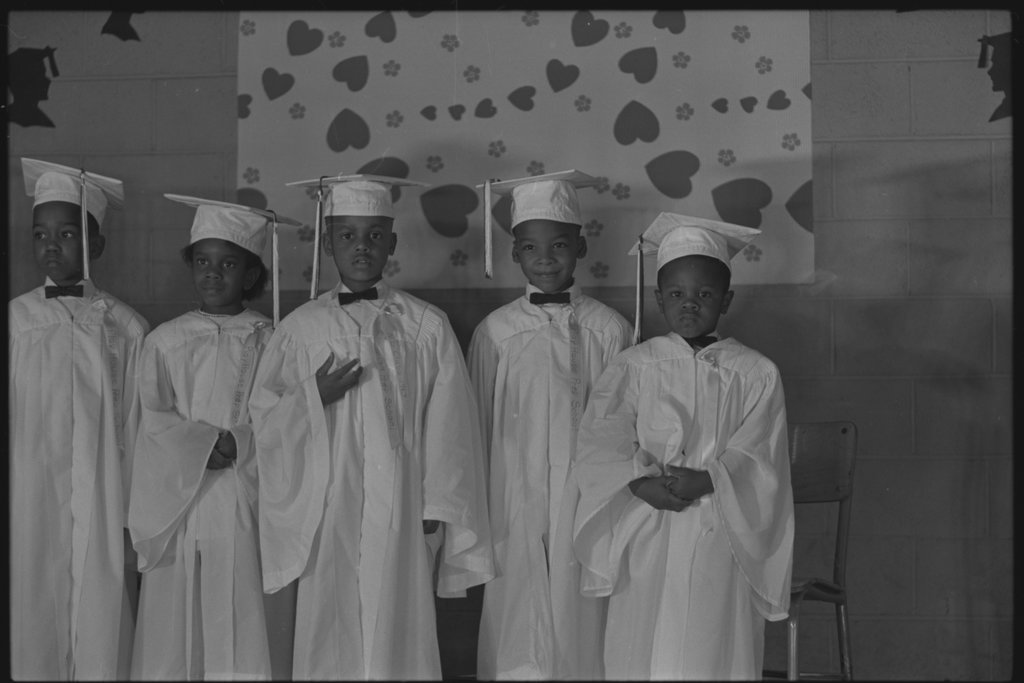 Eric Mann and classmates during graduation - Flerlage, Raeburn, 1915-2002