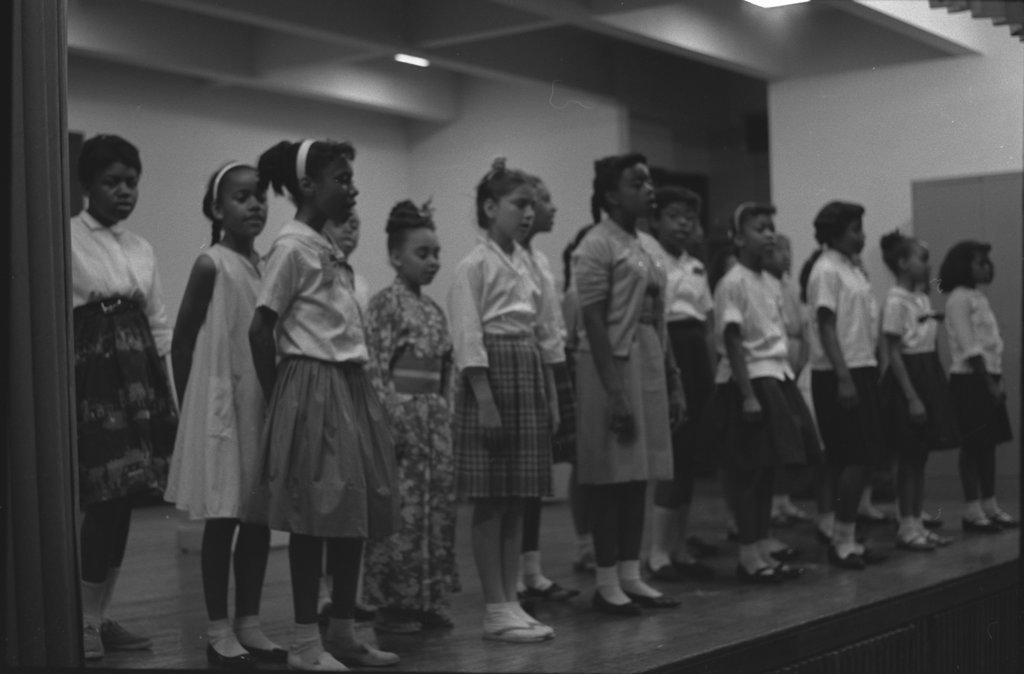 Performance in school auditorium - Flerlage, Raeburn, 1915-2002