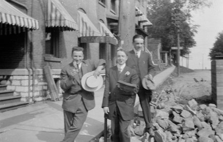 Three men standing outside - YMCA of Metropolitan Chicago