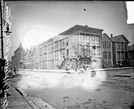 Damico and Co. Groceries, across intersection of North Cleveland Avenue and West Oak Street - Chicago Daily News, Inc.