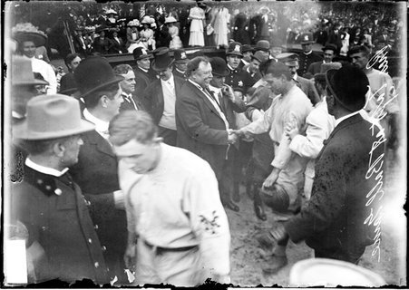 President William H. Taft shaking hands with NY Giants catcher, Myers on the diamond at the West Side Grounds - Chicago Daily News, Inc.