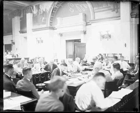 Morris Eller sitting at a table during a campaign funds investigation - Chicago Daily News, Inc.
