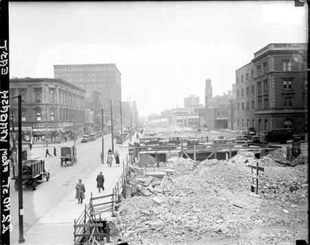 Construction taking place in a lot on Twenty-second Street in the Near South Side community area - Chicago Daily News, Inc.
