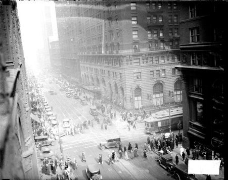 Pedestrians walking and automobiles driving on LaSalle and Madison Streets in front of the Hotel LaSalle - Chicago Daily News, Inc.