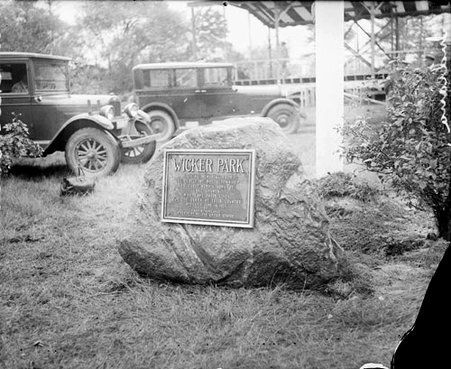 Memorial plaque mounted on a boulder in Wicker Park, Hammond, Indiana - Chicago Daily News, Inc.