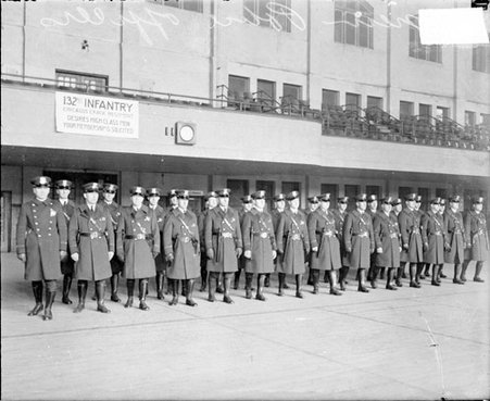 Group of new police officers standing in rows in a gymnasium - Chicago Daily News, Inc.