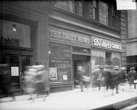Chicago Daily News office, viewed at an angle, with DeMet's Candles store visible, dark exposure - Chicago Daily News, Inc.