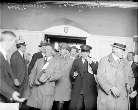 Bremen Flyers walking in a room in a building - Chicago Daily News, Inc.