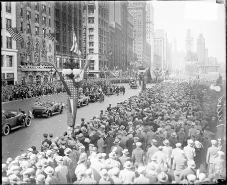 Crowds lining the sidewalks on South Michigan Avenue during a parade for the Bremen Flyers - Chicago Daily News, Inc.