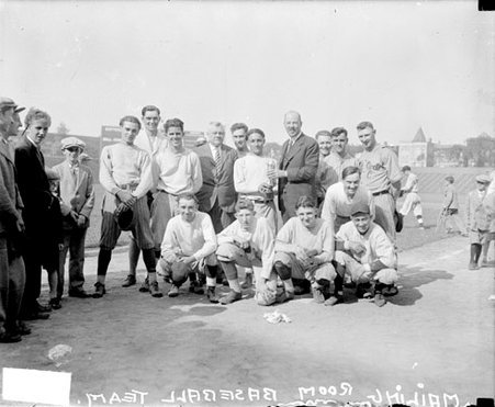 Chicago Daily News Mailing Room baseball team posing with a trophy on a baseball field - Chicago Daily News, Inc.