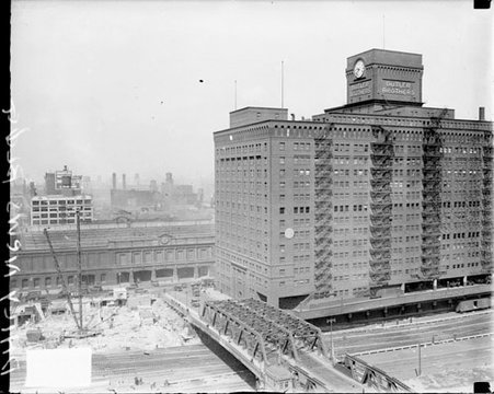Butler Brothers building standing next to the construction site of the new Chicago Daily News building, light exposure - Chicago Daily News, Inc.