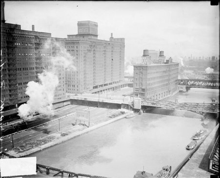 Chicago River passing by the Butler Brothers building, near the construction site for the Chicago Daily News building, dark exposure - Chicago Daily News, Inc.