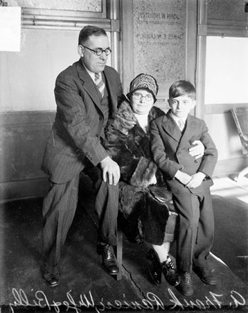 Ranieri case, Billy Ranieri, and his parents looking toward the camera, sitting in a room - Chicago Daily News, Inc.