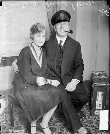 Count Felix von Luckner, the Terran raider, sitting with his wife in a room, looking toward the camera, light exposure - Chicago Daily News, Inc.