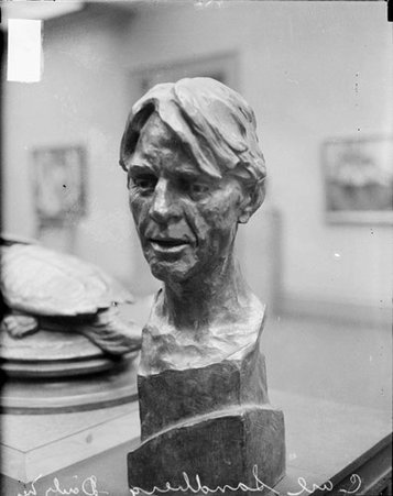 Bust of writer and musician Carl Sandburg facing the camera - Chicago Daily News, Inc.