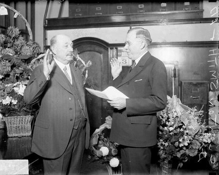 Clayton F. Smith and Illinois State Senator Edward J. Glackin during a swearing-in ceremony, light exposure - Chicago Daily News, Inc.