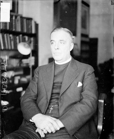 Rev. Almon H.P. Abbott and wife, looking right - Chicago Daily News, Inc.