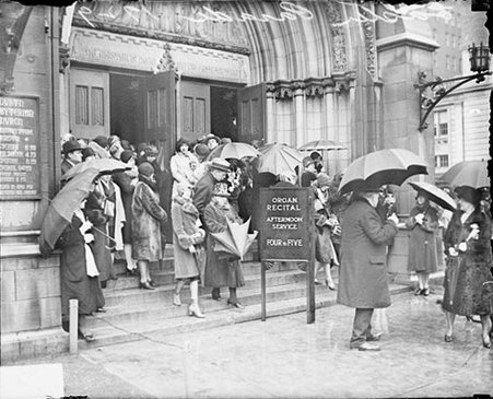 People leaving Chicago's Fourth Presbyterian Church after organ recital - Chicago Daily News, Inc.