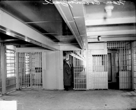 Unidentified man in jail cell at Criminal Court building - Chicago Daily News, Inc.