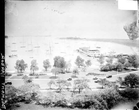 Sailboats sitting in Belmont Harbor with Lake Michigan visible in background, light exposure - Chicago Daily News, Inc.