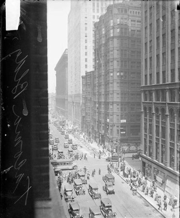Tacoma Building in Chicago with pedestrians and automobiles nearby, dark exposure - Chicago Daily News, Inc.
