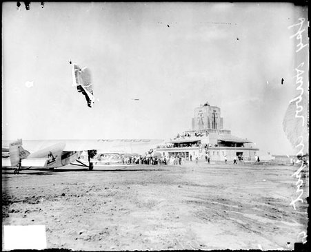 Airplane sitting on a dirt airfield at Sky Harbor Airport in Glencoe, Illinois - Chicago Daily News, Inc.