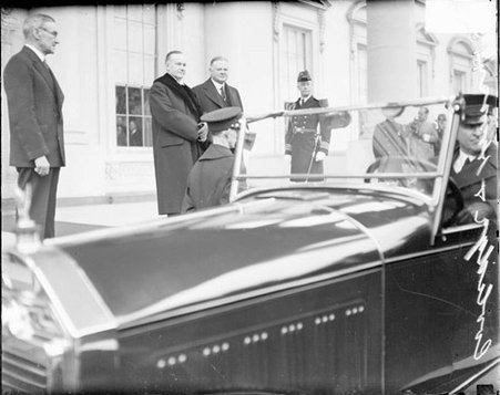Herbert Hoover and Calvin Coolidge standing in front of the White House - Chicago Daily News, Inc.