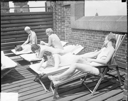 Women on lounges on sun roof of Women's Athletic Club - Chicago Daily News, Inc.