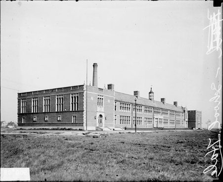 Hale School, viewed at an angle from a field - Chicago Daily News, Inc.