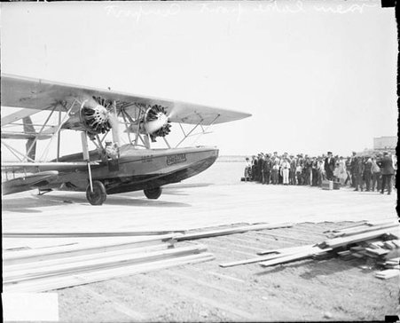 New lakefront airport, amphibious airplane sitting on an airfield covered with planks - Chicago Daily News, Inc.