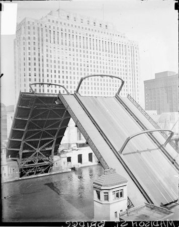 Retractable Madison Street Bridge standing open over the Chicago River - Chicago Daily News, Inc.