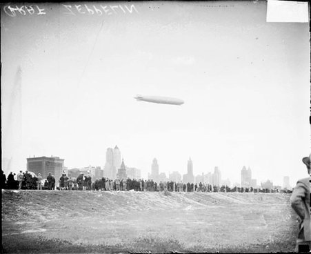 Graf Zeppelin flying over the Chicago skyline - Chicago Daily News, Inc.
