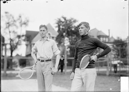 Tennis players H. T. Danforth and St. John standing on a tennis court - Chicago Daily News, Inc.