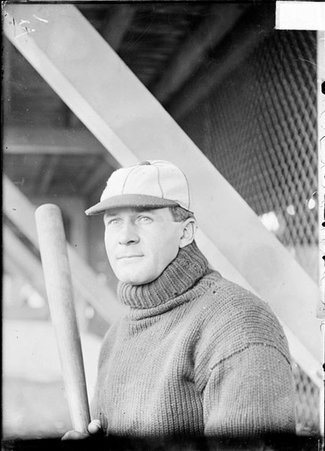 Baseball player, Lew Drill, Washington Senators, standing in front of bleacher buttresses - Chicago Daily News, Inc.