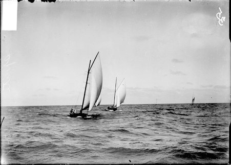 Yacht, La Rita, sailing on Lake Michigan, with another yacht nearby, and two in distance - Chicago Daily News, Inc.
