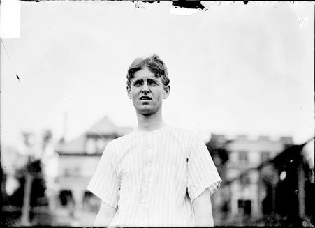 Tennis player, R.G. Hunt, standing outdoors - Chicago Daily News, Inc.