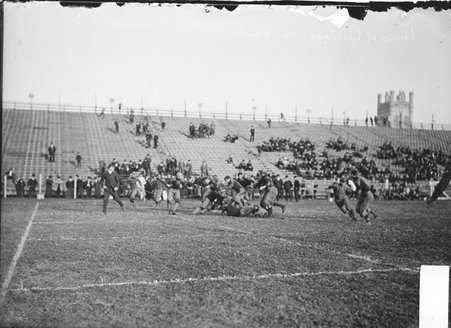 Football game, Cornell University-University of Chicago, tackle after a pass - Chicago Daily News, Inc.