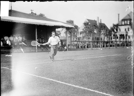 Tennis player, Bingham, right foot on baseline, positioning for forehand stroke - Chicago Daily News, Inc.