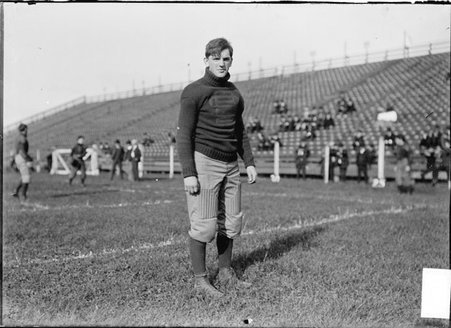Football player, Noel Dunbar, University of Chicago, standing on Marshall Field - Chicago Daily News, Inc.
