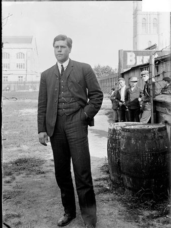 Athlete, Ellsworth, standing outdoors on Marshall Field - Chicago Daily News, Inc.