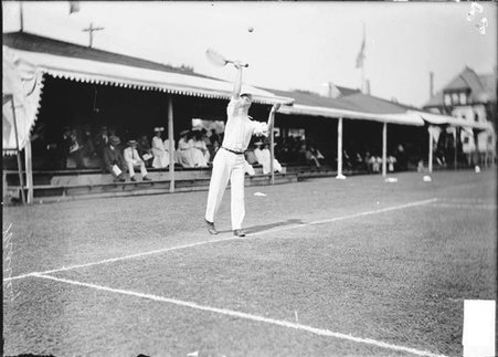 Tennis player, Morley, serving the ball - Chicago Daily News, Inc.