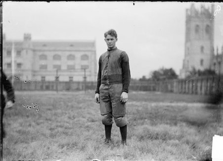 Football player, Lee Maxwell, University of Chicago, standing near center field, Marshall Field - Chicago Daily News, Inc.