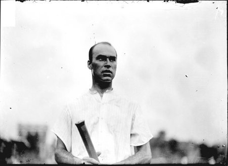 Tennis player, Burton, standing outdoors - Chicago Daily News, Inc.
