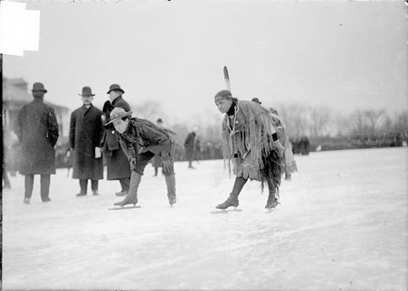 Speed skating, two costumed skaters in the style of a scout and Native American, Humboldt Park - Chicago Daily News, Inc.