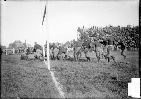 Football game, University of Chicago-Purdue University, running play near goalpost, Marshall Field - Chicago Daily News, Inc.