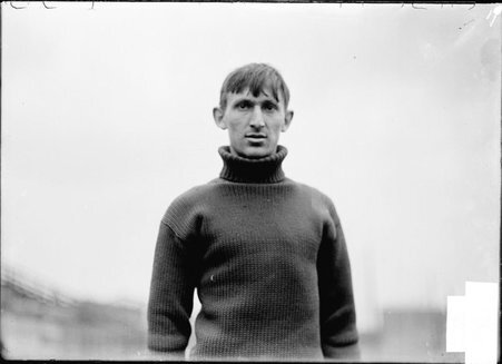 Athlete, Saridakis, University of Chicago, standing at Marshall Field - Chicago Daily News, Inc.