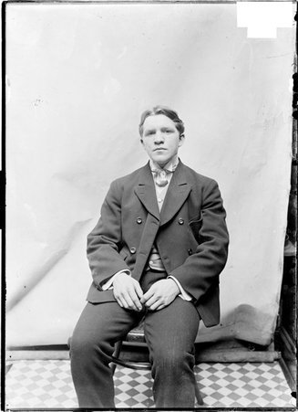 Pugilist, Tommy Moore, sitting, facing camera - Chicago Daily News, Inc.