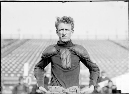 Football player, Lee, University of Chicago, standing at Marshall Field - Chicago Daily News, Inc.