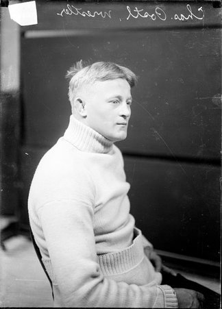 Wrestler, Charles Postl, sitting in profile - Chicago Daily News, Inc.