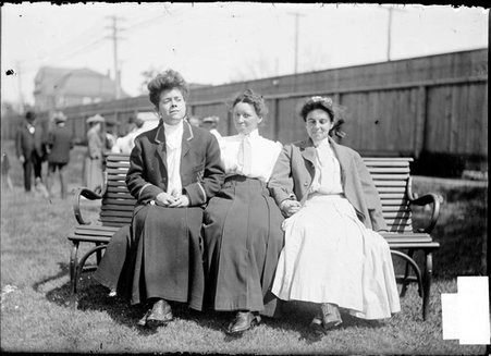 Golfers, Miriam Anthony, Mrs. W. Herrick, and Margaret Morris, sitting on a bench - Chicago Daily News, Inc.